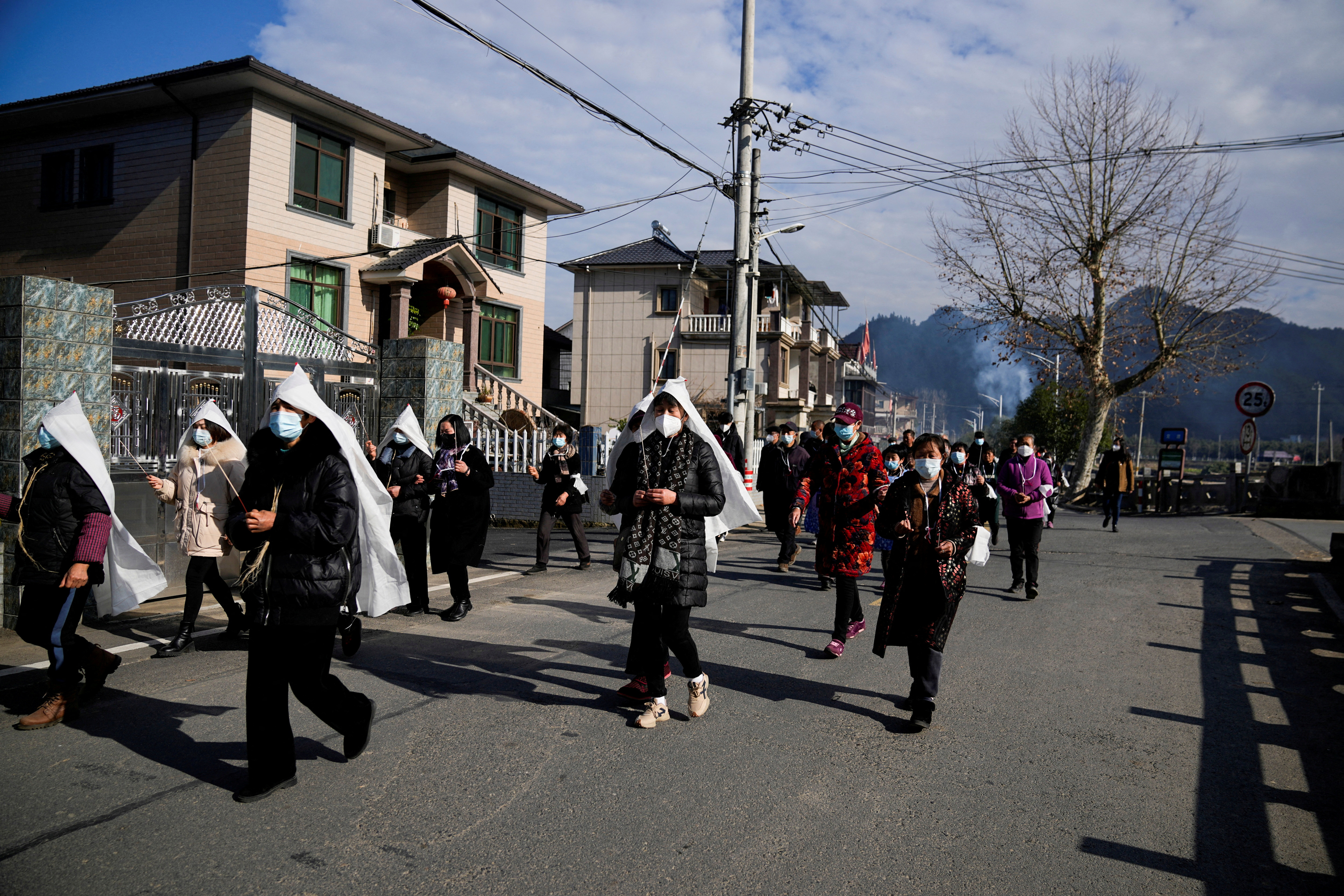 China reports 59,938 COVID-related hospital deaths since Dec. 8